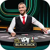 Table de baccarat VIP animée par un croupier professionnel.